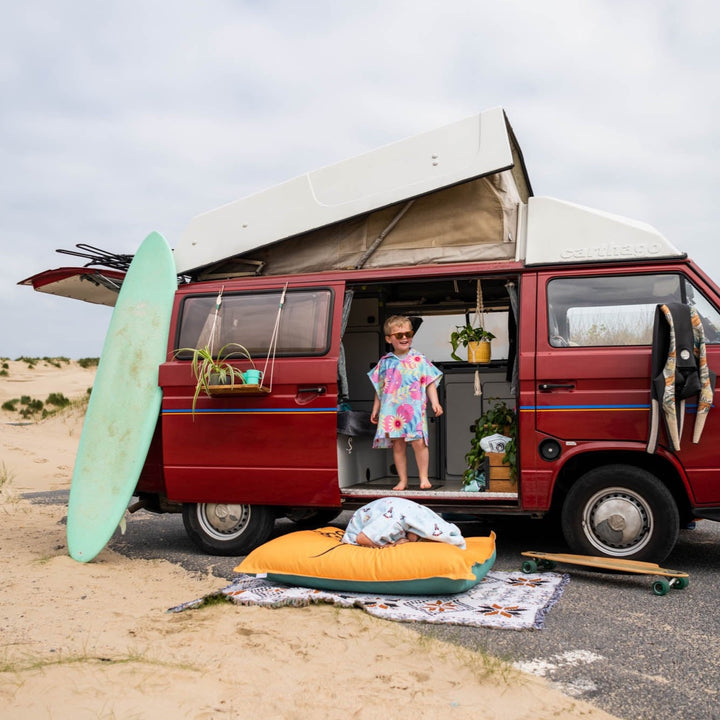 Flower surf ponchos kids op camping