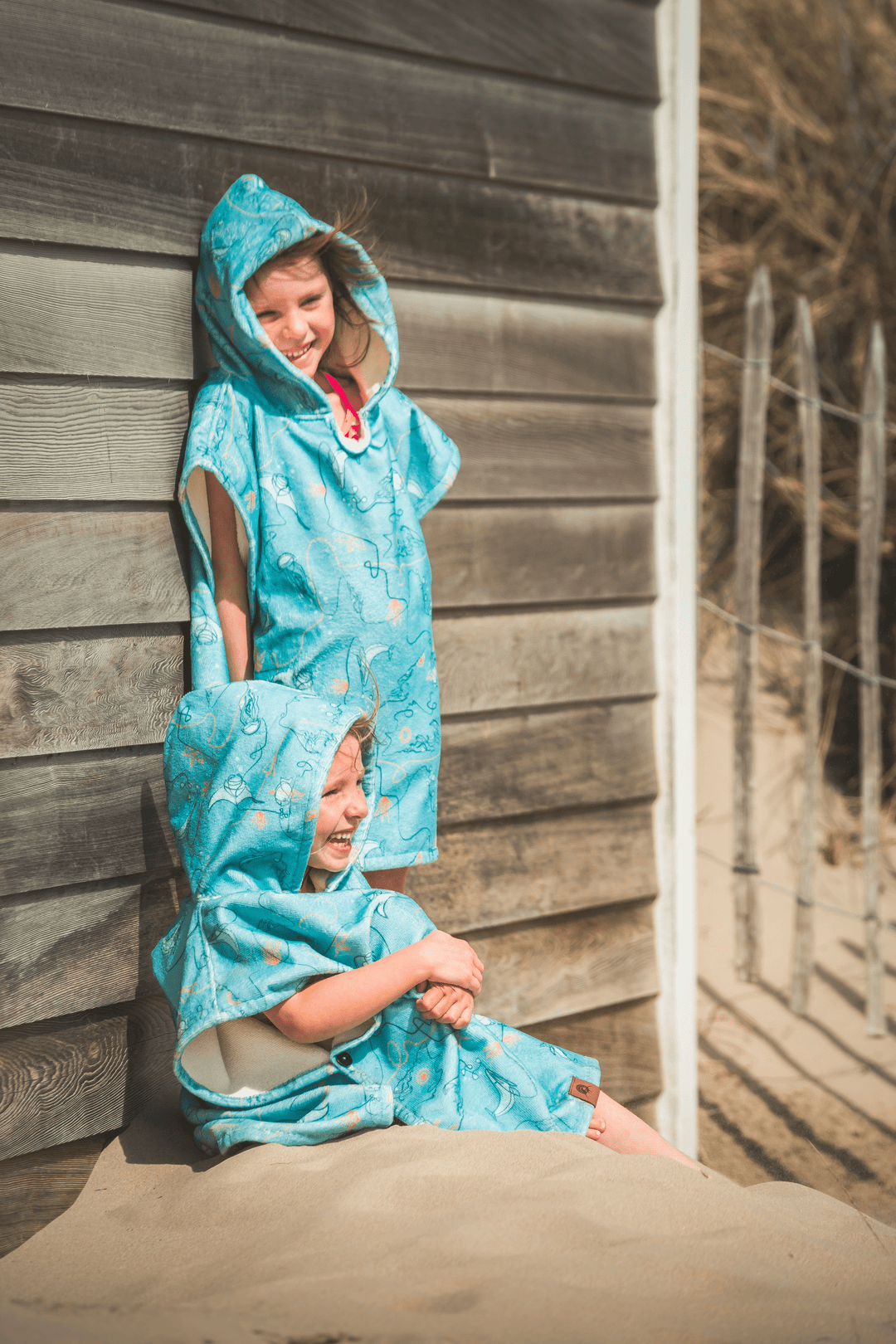 The Kids surf poncho is a must-have for the youngest beach lovers. No more struggle to get them changed, no more worries about them getting cold after a swim. They feel like a fish in the ocean with our supersoft changing towel.
